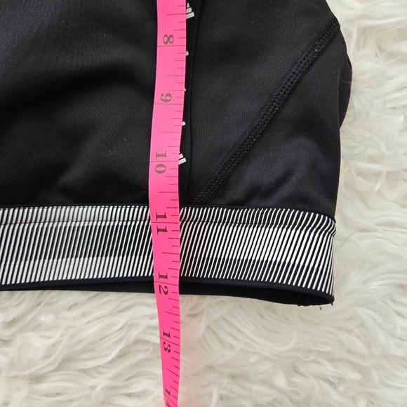 Adidas Strappy Sports Bra. No size tag. Fits like a medium. Good preowned condit - Picture 5 of 5
